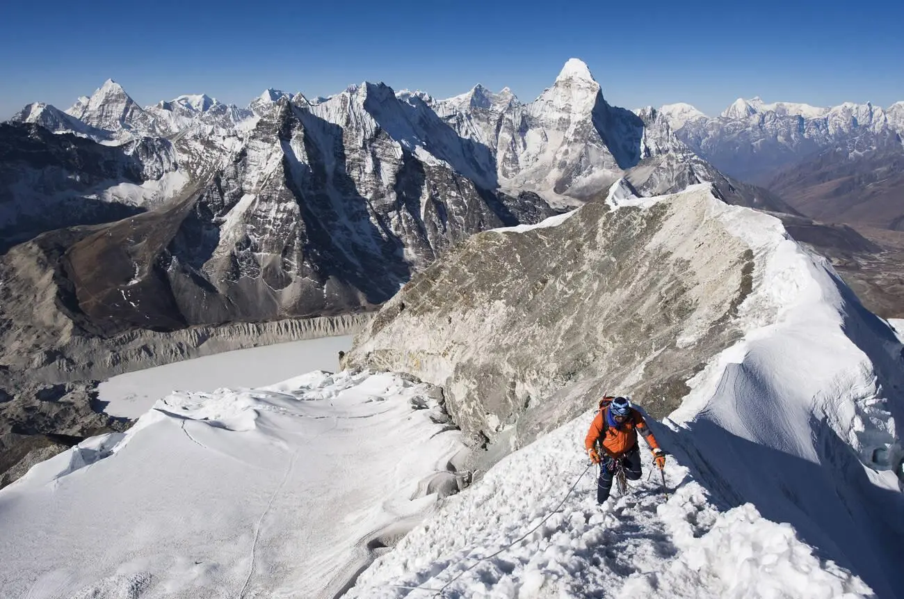 Climber on summit ridge of Island Peak, 6189m, Nepal
